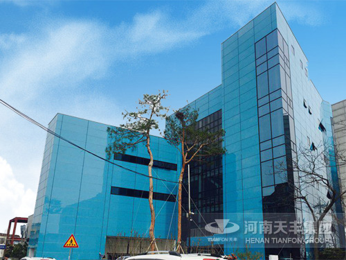 Glass surface and metallic curtain wall panel